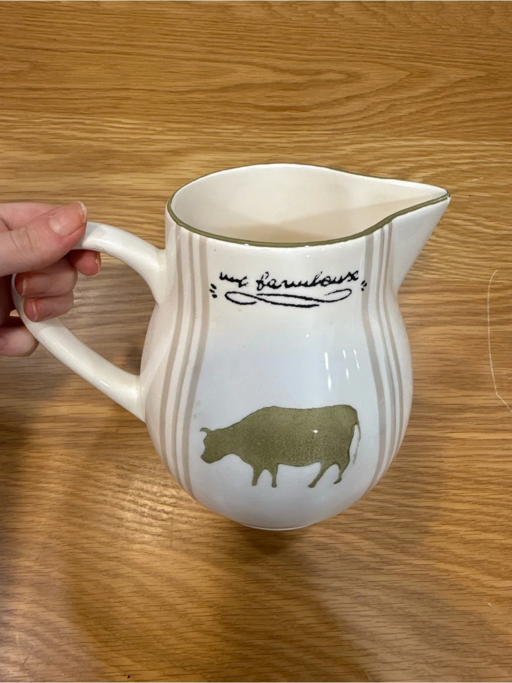 White Ceramic Farmhouse Pitcher with Olive Cow Motif